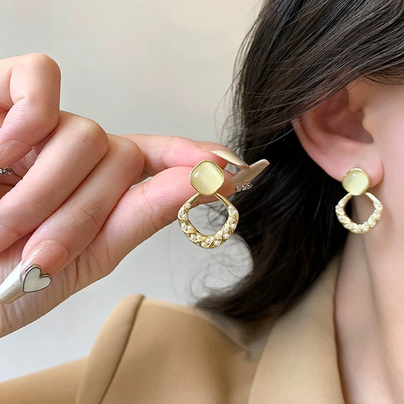 French Cream Cat Eye Pearl Twist Hollow Drop Earrings