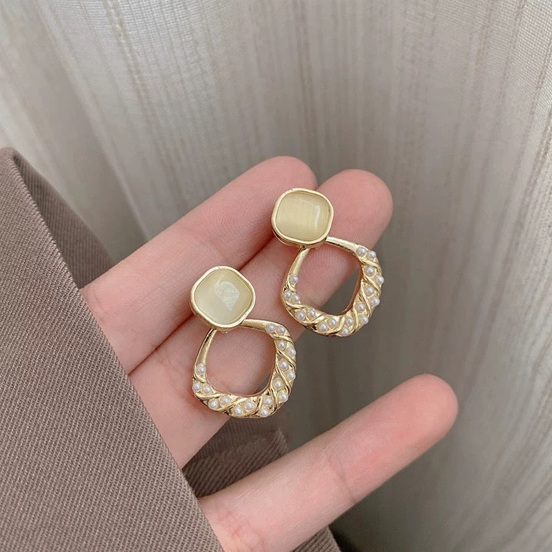 French Cream Cat Eye Pearl Twist Hollow Drop Earrings